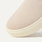 Close up of the toe and vamp of The Kids Sneaker in Sand.