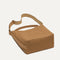 The Bucket Bag in Hazelnut shown laid down.
