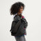 hover | The Bucket Bag in Night Song shown on model. 