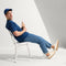 Alternate view of a model wearing The RS01 Sneaker in Bone.