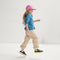 Alternate view of a model wearing The Kids Strap Sneaker in Spruce Camo. 