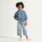 Alternate image of a child modeling The Kids Strap Sneaker in Vanilla Ice. 