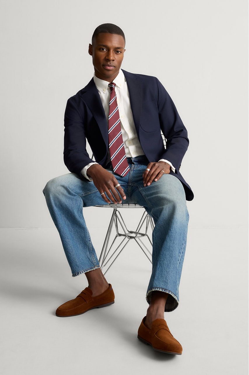 Model wearing The Ravello Penny Loafer in ReVelvet Russet.