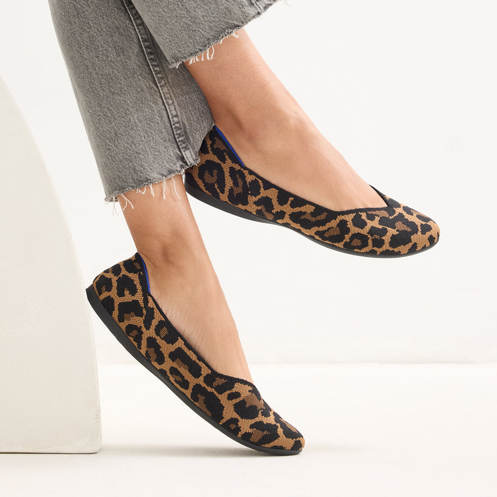 Model wearing The Daily Flat in Sable Spot.