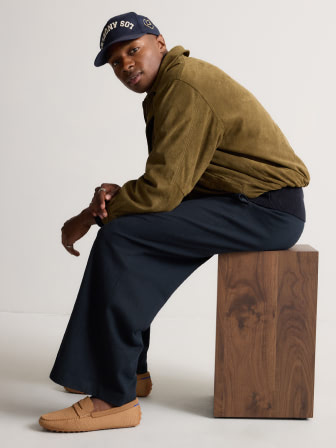 Model wearing The Ravello Penny Loafer in Russet. 