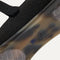The sole of The Square Mary Jane in Black shown in diagonal view. 