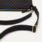 The Mini Zip Bucket in Black Sand lying flat, shown at a diagonal view from the left.