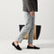 Alternate view of a model wearing The Almond Loafer in Black.