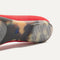 Close up of the outsole of The Point II in Lollipop Red, shown in a diagonal view.