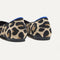 Close up of the heel of The Point II in Desert Cat, with Rothy's signature blue halo. 