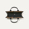 The Classic Tote in Grand Piano, shown from above, with the interior exposed.