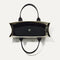 The Classic Tote in Luna, shown from above, with the interior exposed.