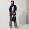hover | Overlay:: Shown with The Mini Zip Bucket (sold separately.) | Alt:: Alternative image of The Crossbody Strap in Navy & Red, shown paired with The Mini Zip Bucket, worn by a model, shown from the side.