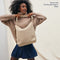 The Bucket Bag in Knot Brown shown paired with The Shoulder Strap in White.