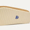 Close up of the outsoles of The Casual Clog in Wheat Rafia Knit.