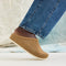hover | Model wearing The Casual Clog in Wheat Rafia Knit.