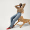 Alternate view of a model wearing The Almond Slingback. 