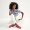 Alternate view of a model wearing The Cruiser Loafer in Fuchsia Bloom.