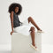 Alternate view of a model wearing The Cruiser Mary Jane in White Sand.