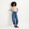Alternative angle of model wearing The Max Square in Ruby.