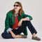 Alternate view of a model wearing The Double Bit Driver in Classic Micro Check. 