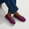 hover | Model wearing The Double Bit Driver in Purple Sapphire. 