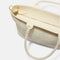 A close up of The Lightweight Zip Tote in Moonflower focusing on the zip closure and handles.