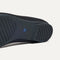 The sole of The Max Square Mary Jane in Black shown in diagonal view.