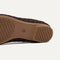 The sole of The Max Square Mary Jane in Chocolate shown in diagonal view.