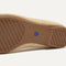 The sole of The Max Square Mary Jane in Cream Raffia-Knit shown in diagonal view.