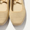 Top view of the square toe and rounded vamp of The Max Square Mary Jane in Cream Raffia-Knit.