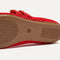 The sole of The Double Buckle Mary Jane in Bright Red Mesh.