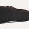 The sole of The Double Buckle Mary Jane in Chocolate Mesh.
