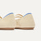 Close up of the heel of The Double Buckle Mary Jane in Powder Crochet, with Rothy's signature blue halo.