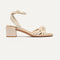 The Knot Sandal in Conch shown from the side.