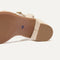 Close up of the outsoles of The Knot Sandal in Conch.
