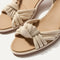 Close up of the knot detail of The Knot Sandal in Conch.
