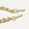 A close-up of The Crossbody Strap in Powder Chain, focusing on the end snap hooks.