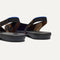Close up of the strap on The Almond Slingback in Brown Torte, with Rothy's signature blue halo.