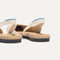 Close up of the heel The Almond Slingback in Conch Captoe, with Rothy's signature blue halo.