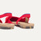 Close up of the heel The Almond Slingback in Lollipop Red, with Rothy's signature blue halo.