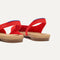 Close up of the strap on The Almond Slingback in Poppy Mesh, with Rothy's signature blue halo.