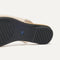 Close up of the outsole of The Almond Slingback in Conch Captoe.