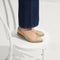 hover | Model wearing The Almond Slingback in Metallic Prosecco.