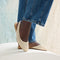 hover | Model wearing The Almond Slingback in Off White Mesh. 
