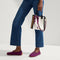 The Shoulder Strap in Velvet Plum Chain, shown paired with The Petite Classic Tote.