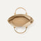 The Zip Travel Tote in Parchment Basketweave, shown from above with the interior exposed.