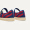Close up of the heel of The Espadrille Mary Jane in Cherry Tide, with Rothy's signature blue halo. 