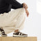 Alternate view of a model wearing The Men's Court Sneaker in Dugout.