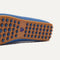 Close up of the supportive peg outsoles of The Daily Driver in Blue Sea. 